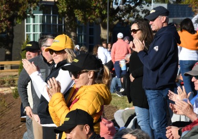 Families cheering on the Field Hockey team