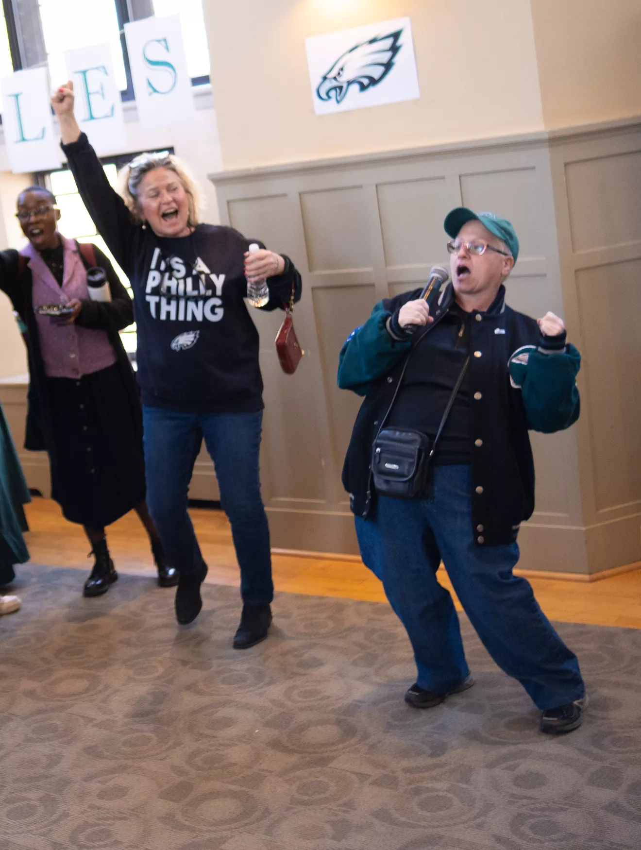 Angie Sheets doing Eagles cheer at Super Bowl Pep Rally in Campus Center