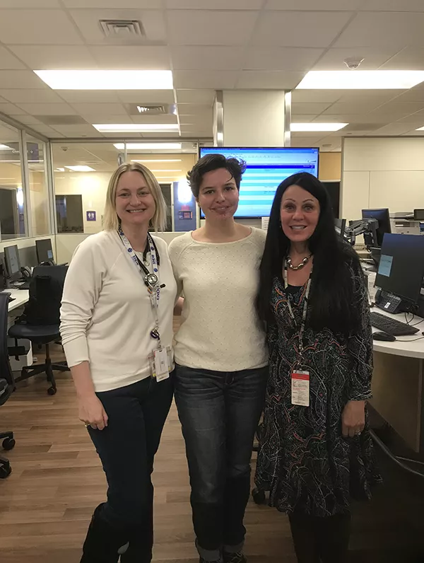 Toni Ekerdt '19  (center), Jan (Hangen) Walker '79, and Melanie Cree Green ’99. All three are biology majors and green lanterns.