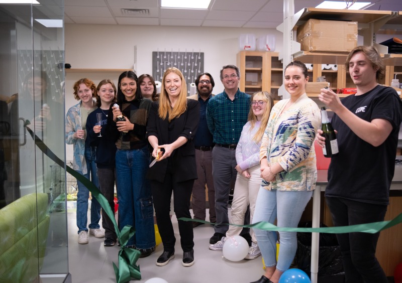 Asja Radja with students at lab opening