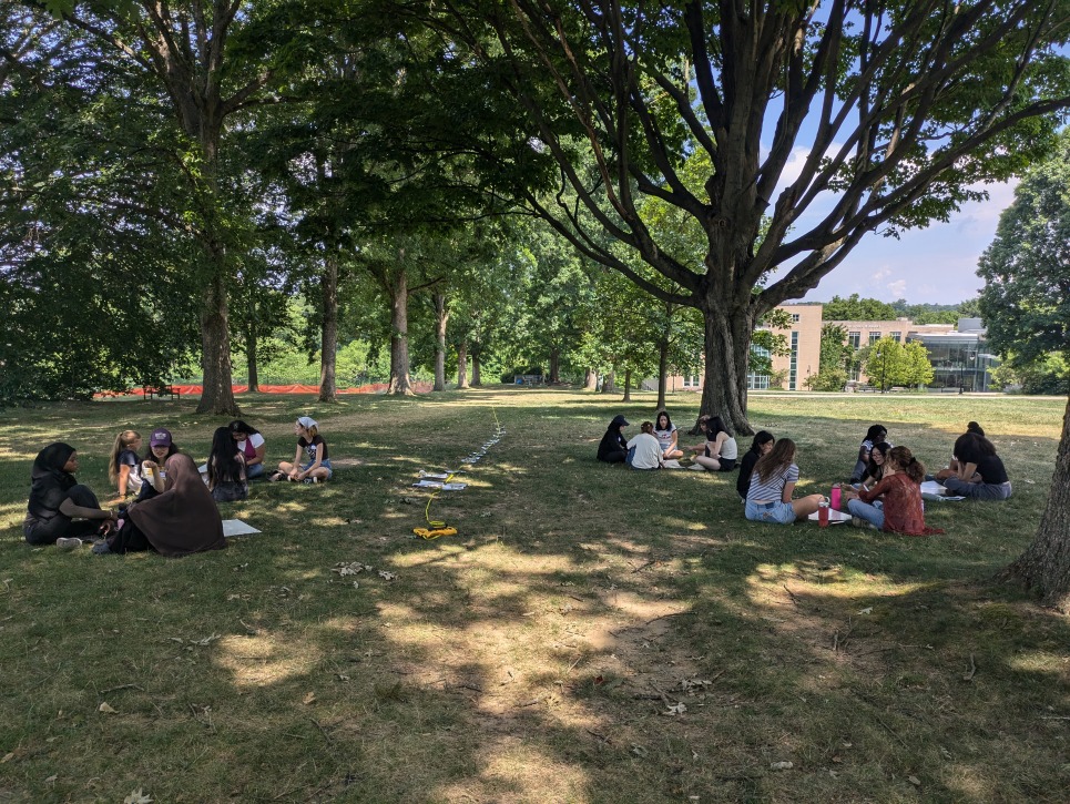 students outside mapping geologic time