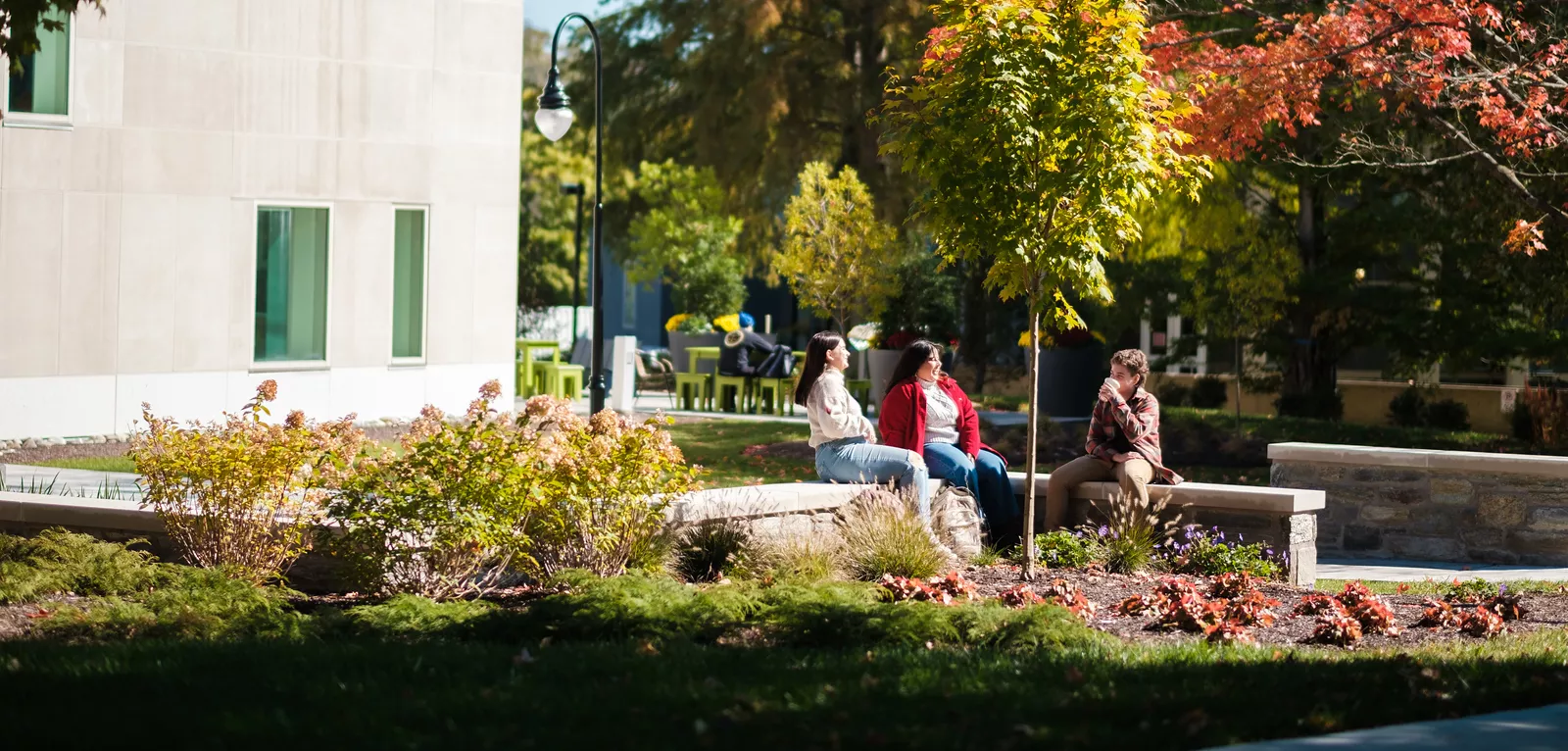 The Well exterior with students 