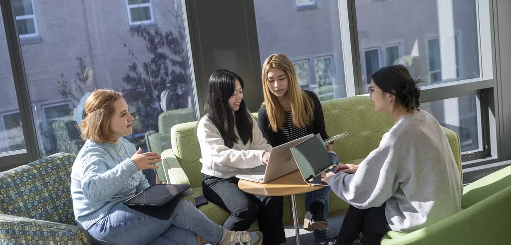 students seated in park science