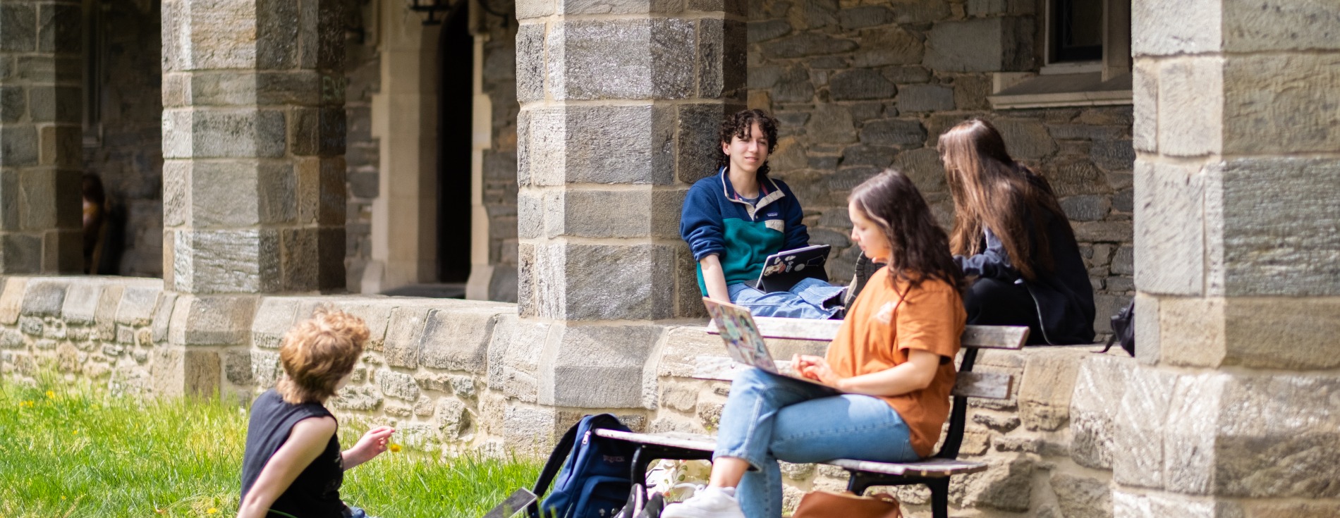 Students sitting in Cloisters