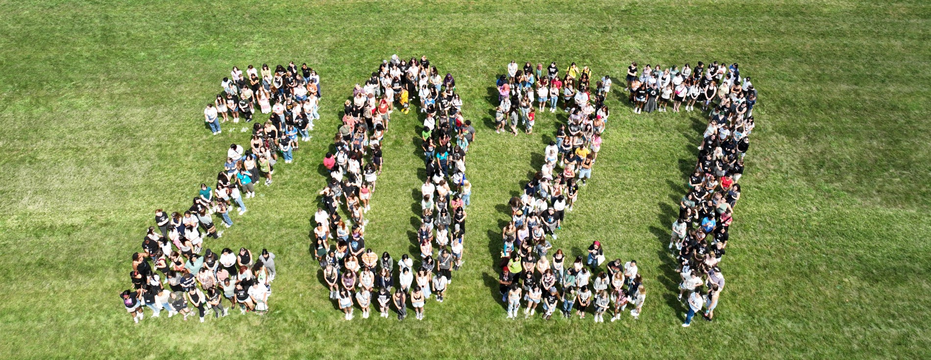drone-shot-of-people-forming-2027