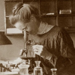Nettie Stevens at a microscope