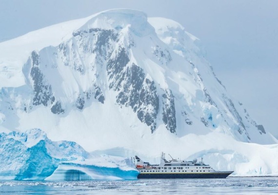 Iceberg and Ship in Antarctica 