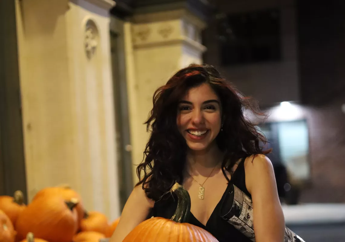 Rana Rastegari '26 holding a pumpkin