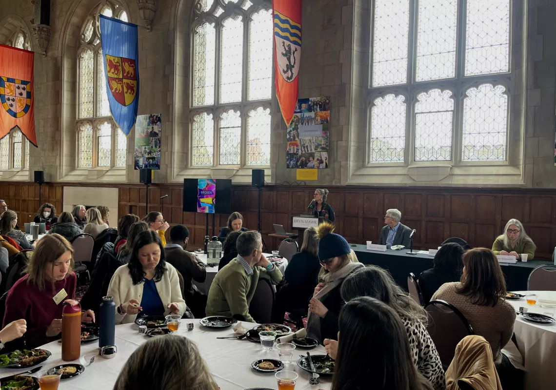 Wide shot of Great Hall filled with people attending the lecture