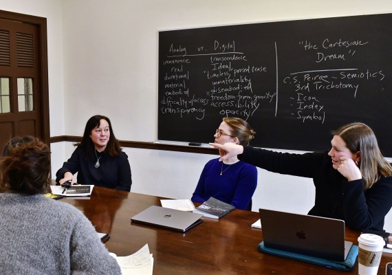 professor and students in a classroom