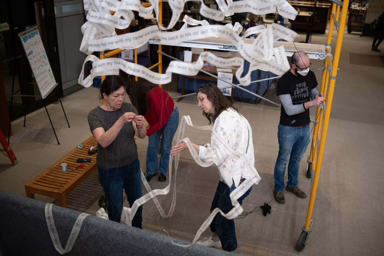 Cecilia Paredes works on her sculpture in Canaday Library.