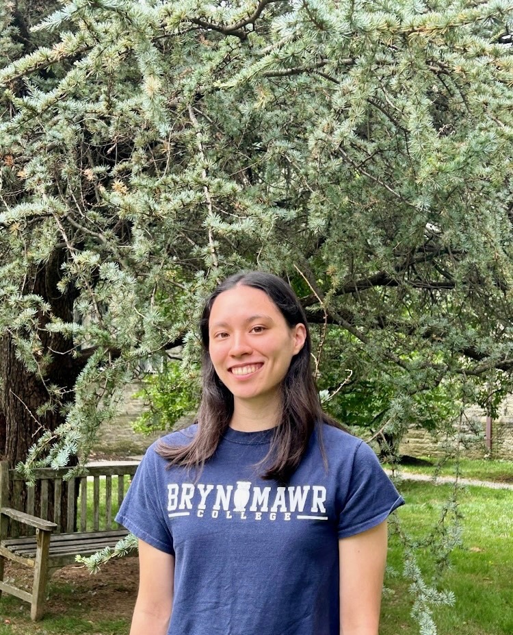 Girl smiling in a navy blue BMC shirt.