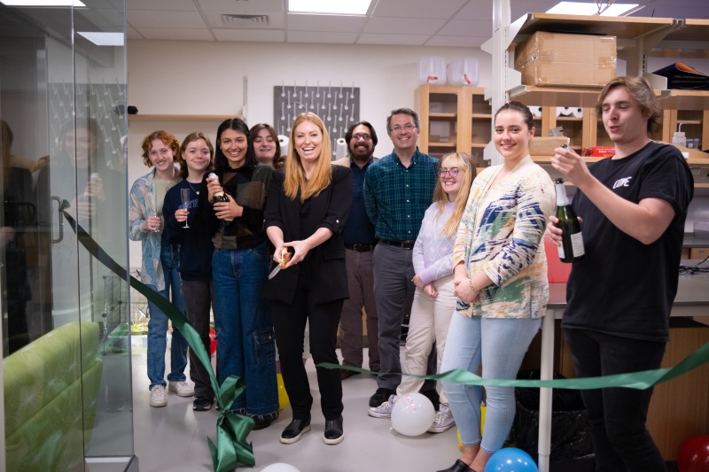 Asja Radja with students at lab opening